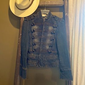 Slightly distressed denim jacket made by Moon. Size small and never worn.